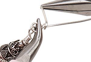 Pliers creating a wrapped loop